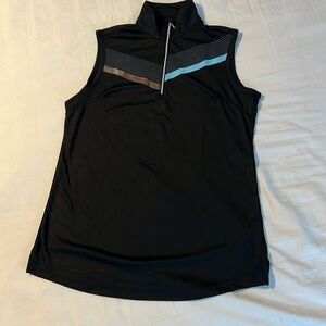 GOLF!  Women’s sleeveless zippered golf top.